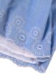 Blaues ärmelloses knielanges Baby Kinder Kleidchen mit weißen Stickereien, Troddeln Quasten, Träger mit Rüschen, Smokeinsatz am Rücken aus 100% Baumwolle für Mädchen Sommer von Minoti - Detailansicht